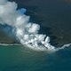 lawa wulkanu Kilauea wpadajaca do oceanu