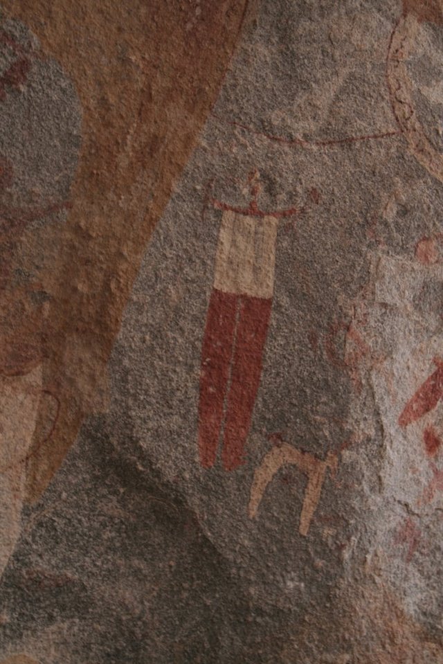 Prehistoryczne rysunki - człowiek z psem