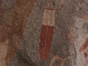 Prehistoryczne rysunki - człowiek z psem