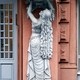 Kijów rzeźba kobieca na secesyjnym budynku