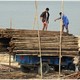 Przeładunek bambusów nad Irawadi