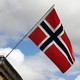 Flaga nad sklepem z pamiątkami w Norwegii