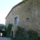 Púbol - surowa kamienna ściana frontowa posiadłości Salvadora Dali