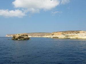 Isola dei Conigli i skała obok