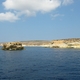 Isola dei Conigli i skała obok