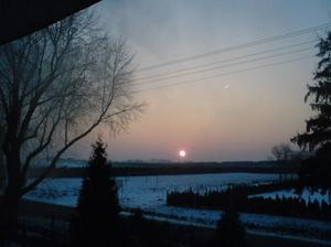 Zimowy zachód słońca w Prusach