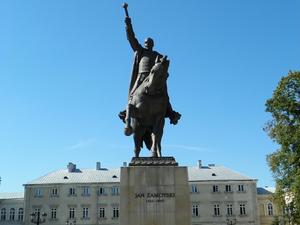 Kanclerz Jan Zamoyski, na tle swej akademii w Zamościu